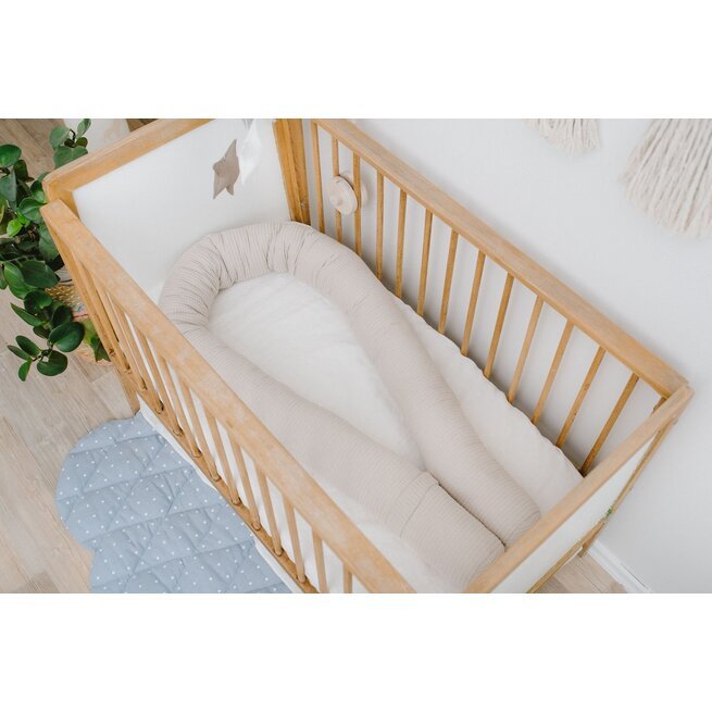 Kreminės "Vafliuko" apvalios lovytės apsaugos kūdikiams